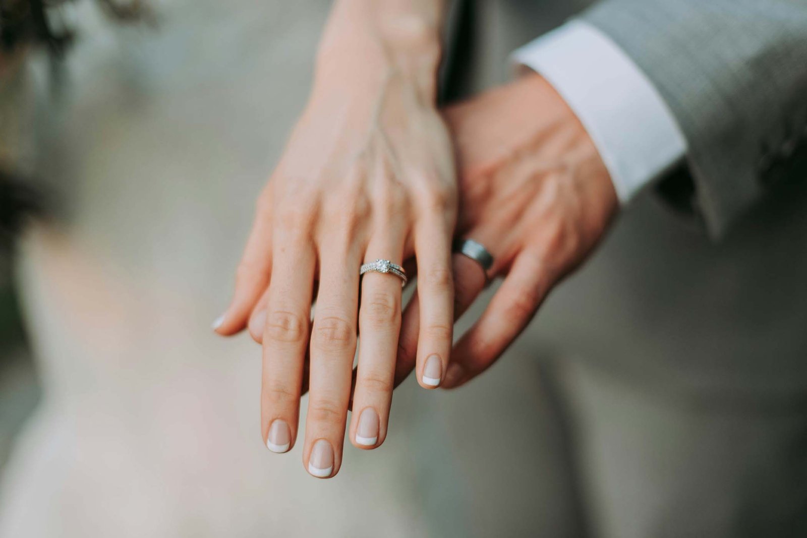Hands with wedding rings